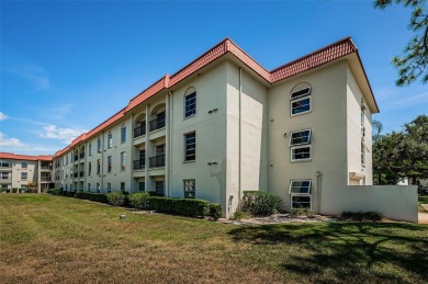 Location, location! Ground floor unit right by the pool & rec on The Dunedin Country Club in Florida - for sale on GolfHomes.com, golf home, golf lot