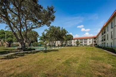 Location, location! Ground floor unit right by the pool & rec on The Dunedin Country Club in Florida - for sale on GolfHomes.com, golf home, golf lot
