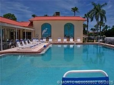 Centrally located on the 2nd floor overlooking the beautifully on Monterey Yacht and Country Club in Florida - for sale on GolfHomes.com, golf home, golf lot