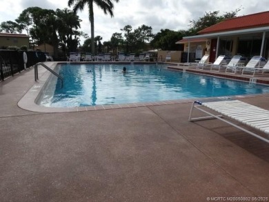 Centrally located on the 2nd floor overlooking the beautifully on Monterey Yacht and Country Club in Florida - for sale on GolfHomes.com, golf home, golf lot