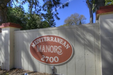 Location, location! Ground floor unit right by the pool & rec on The Dunedin Country Club in Florida - for sale on GolfHomes.com, golf home, golf lot