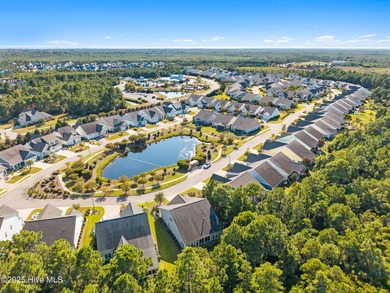 Privacy abounds, ease of maintenance-free living and convenience on Members Club At St. James Plantation in North Carolina - for sale on GolfHomes.com, golf home, golf lot