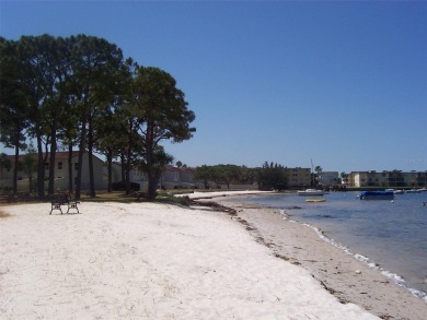 Location, location! Ground floor unit right by the pool & rec on The Dunedin Country Club in Florida - for sale on GolfHomes.com, golf home, golf lot