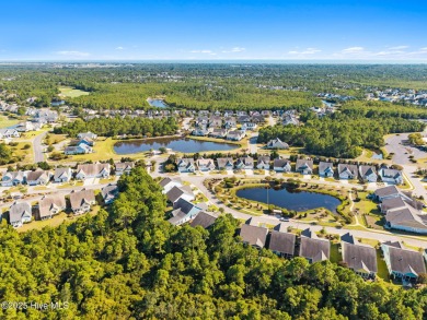 Welcome to this beautiful, like-new cottage-style home located on Members Club At St. James Plantation in North Carolina - for sale on GolfHomes.com, golf home, golf lot