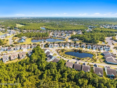Privacy abounds, ease of maintenance-free living and convenience on Members Club At St. James Plantation in North Carolina - for sale on GolfHomes.com, golf home, golf lot