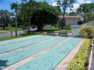 Centrally located on the 2nd floor overlooking the beautifully on Monterey Yacht and Country Club in Florida - for sale on GolfHomes.com, golf home, golf lot