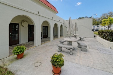 Location, location! Ground floor unit right by the pool & rec on The Dunedin Country Club in Florida - for sale on GolfHomes.com, golf home, golf lot