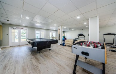 Location, location! Ground floor unit right by the pool & rec on The Dunedin Country Club in Florida - for sale on GolfHomes.com, golf home, golf lot