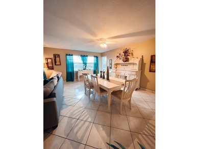 RARE & SPACIOUS 3-BEDROOM 3-BATHS WITH STUNNING LAKE & GOLF on Lauderhill Golf Course in Florida - for sale on GolfHomes.com, golf home, golf lot