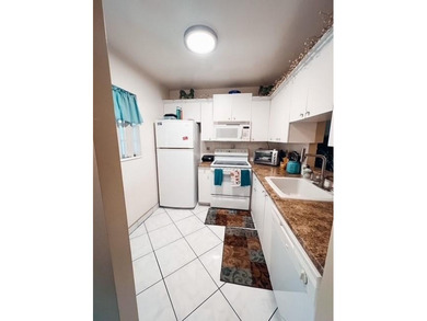 RARE & SPACIOUS 3-BEDROOM 3-BATHS WITH STUNNING LAKE & GOLF on Lauderhill Golf Course in Florida - for sale on GolfHomes.com, golf home, golf lot