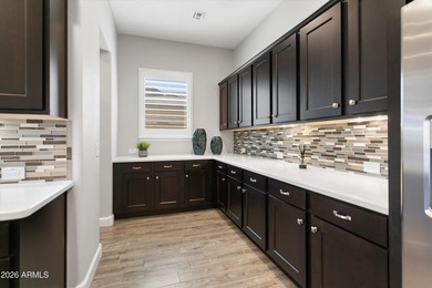 Absolutely stunning from the moment you arrive--beginning with on Estrella Mountain Ranch Golf Course in Arizona - for sale on GolfHomes.com, golf home, golf lot