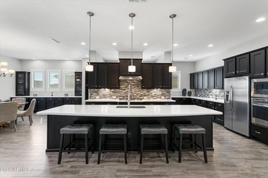 Absolutely stunning from the moment you arrive--beginning with on Estrella Mountain Ranch Golf Course in Arizona - for sale on GolfHomes.com, golf home, golf lot