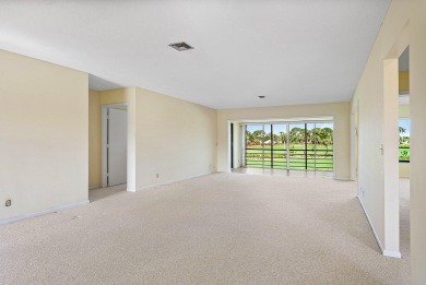Experience timeless comfort and sweeping double fairway views in on Quail Ridge Golf Course and Country Club in Florida - for sale on GolfHomes.com, golf home, golf lot