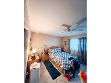 RARE & SPACIOUS 3-BEDROOM 3-BATHS WITH STUNNING LAKE & GOLF on Lauderhill Golf Course in Florida - for sale on GolfHomes.com, golf home, golf lot