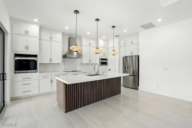 A Modern Masterpiece in Cape Royal Golf Club. Brand-new 2025 on Royal Tee Country Club in Florida - for sale on GolfHomes.com, golf home, golf lot