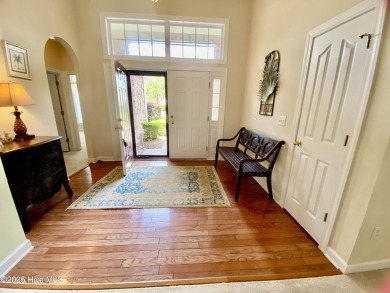 Looking for the home with a 3-car garage, water views, and golf on Sandpiper Bay Golf and Country Club in North Carolina - for sale on GolfHomes.com, golf home, golf lot