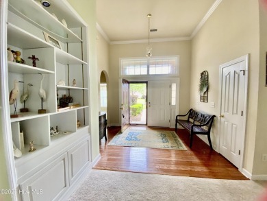 Looking for the home with a 3-car garage, water views, and golf on Sandpiper Bay Golf and Country Club in North Carolina - for sale on GolfHomes.com, golf home, golf lot