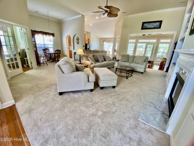 Looking for the home with a 3-car garage, water views, and golf on Sandpiper Bay Golf and Country Club in North Carolina - for sale on GolfHomes.com, golf home, golf lot