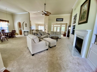 Looking for the home with a 3-car garage, water views, and golf on Sandpiper Bay Golf and Country Club in North Carolina - for sale on GolfHomes.com, golf home, golf lot