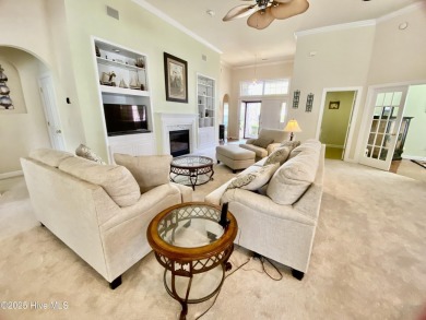 Looking for the home with a 3-car garage, water views, and golf on Sandpiper Bay Golf and Country Club in North Carolina - for sale on GolfHomes.com, golf home, golf lot