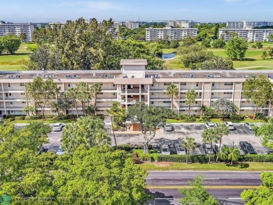 Spacious & move-in ready updated 2 BR/2BA condo on the 2nd floor on Palm-Aire Country Club and Resort - Palms in Florida - for sale on GolfHomes.com, golf home, golf lot