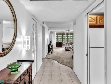 Spacious & move-in ready updated 2 BR/2BA condo on the 2nd floor on Palm-Aire Country Club and Resort - Palms in Florida - for sale on GolfHomes.com, golf home, golf lot