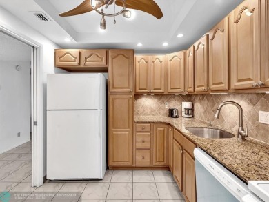 Spacious & move-in ready updated 2 BR/2BA condo on the 2nd floor on Palm-Aire Country Club and Resort - Palms in Florida - for sale on GolfHomes.com, golf home, golf lot