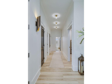 Absolutely Incredible!! This professionally designed home has on Emerald Bay Golf Club in Florida - for sale on GolfHomes.com, golf home, golf lot