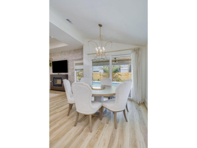 Absolutely Incredible!! This professionally designed home has on Emerald Bay Golf Club in Florida - for sale on GolfHomes.com, golf home, golf lot