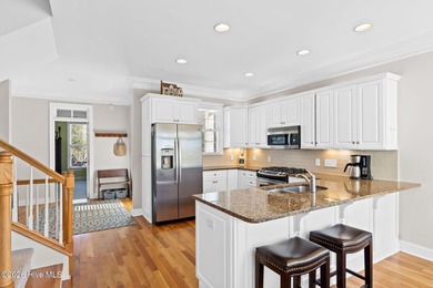 Get ready to fall in love with this luxurious townhome and the on Rivers Edge Golf Club in North Carolina - for sale on GolfHomes.com, golf home, golf lot