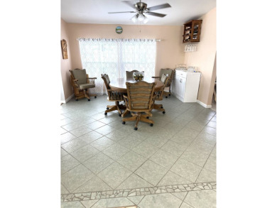 Experience Golf Course Grandeur: Custom-Built 3-Bedroom Palm on Schalamar Creek Golf and Country Club in Florida - for sale on GolfHomes.com, golf home, golf lot
