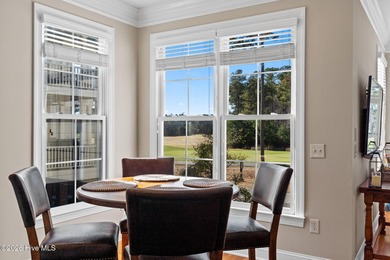 Get ready to fall in love with this luxurious townhome and the on Rivers Edge Golf Club in North Carolina - for sale on GolfHomes.com, golf home, golf lot