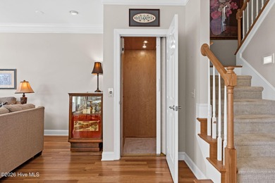 Get ready to fall in love with this luxurious townhome and the on Rivers Edge Golf Club in North Carolina - for sale on GolfHomes.com, golf home, golf lot