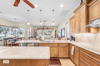 Immerse yourself in this exceptional furnished residence in on Fiddlesticks Country Club in Florida - for sale on GolfHomes.com, golf home, golf lot