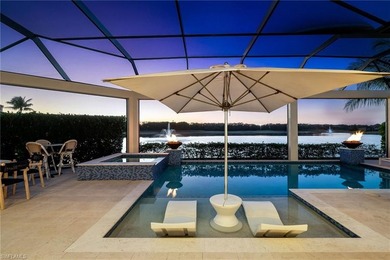 Experience refined waterfront living within the gates of Miromar on Miromar Lakes Golf Club in Florida - for sale on GolfHomes.com, golf home, golf lot