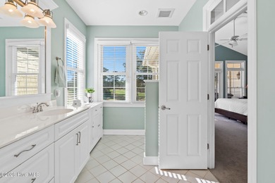 Get ready to fall in love with this luxurious townhome and the on Rivers Edge Golf Club in North Carolina - for sale on GolfHomes.com, golf home, golf lot