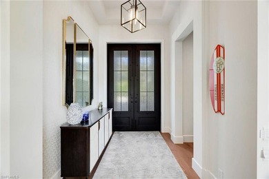 Experience refined waterfront living within the gates of Miromar on Miromar Lakes Golf Club in Florida - for sale on GolfHomes.com, golf home, golf lot