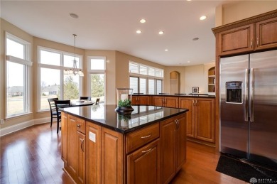 Experience refined living in this exceptional Dunnington custom on The Golf Club At Yankee Trace in Ohio - for sale on GolfHomes.com, golf home, golf lot