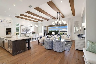 Experience refined waterfront living within the gates of Miromar on Miromar Lakes Golf Club in Florida - for sale on GolfHomes.com, golf home, golf lot