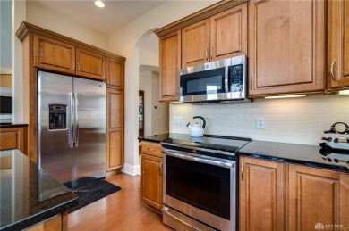 Experience refined living in this exceptional Dunnington custom on The Golf Club At Yankee Trace in Ohio - for sale on GolfHomes.com, golf home, golf lot