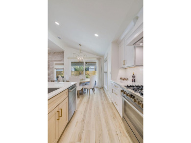 Absolutely Incredible!! This professionally designed home has on Emerald Bay Golf Club in Florida - for sale on GolfHomes.com, golf home, golf lot