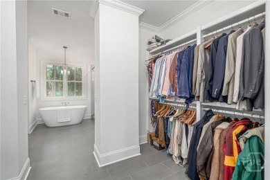 Discover refined Southern living in this nearly new home located on Savannah Quarters Country Club in Georgia - for sale on GolfHomes.com, golf home, golf lot