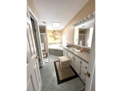Experience Golf Course Grandeur: Custom-Built 3-Bedroom Palm on Schalamar Creek Golf and Country Club in Florida - for sale on GolfHomes.com, golf home, golf lot
