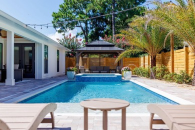 Absolutely Incredible!! This professionally designed home has on Emerald Bay Golf Club in Florida - for sale on GolfHomes.com, golf home, golf lot