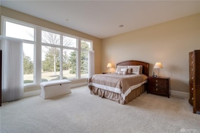 Experience refined living in this exceptional Dunnington custom on The Golf Club At Yankee Trace in Ohio - for sale on GolfHomes.com, golf home, golf lot