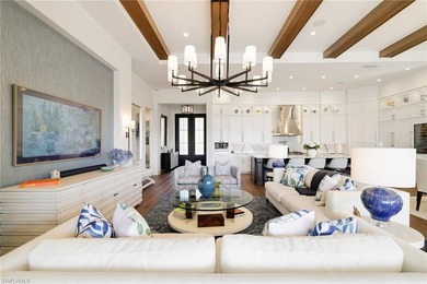 Experience refined waterfront living within the gates of Miromar on Miromar Lakes Golf Club in Florida - for sale on GolfHomes.com, golf home, golf lot