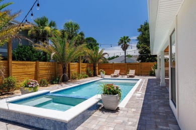 Absolutely Incredible!! This professionally designed home has on Emerald Bay Golf Club in Florida - for sale on GolfHomes.com, golf home, golf lot