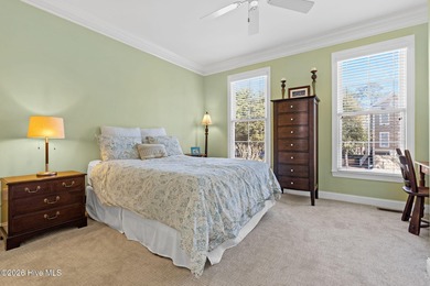 Get ready to fall in love with this luxurious townhome and the on Rivers Edge Golf Club in North Carolina - for sale on GolfHomes.com, golf home, golf lot