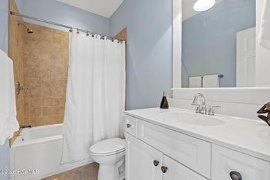 Get ready to fall in love with this luxurious townhome and the on Rivers Edge Golf Club in North Carolina - for sale on GolfHomes.com, golf home, golf lot