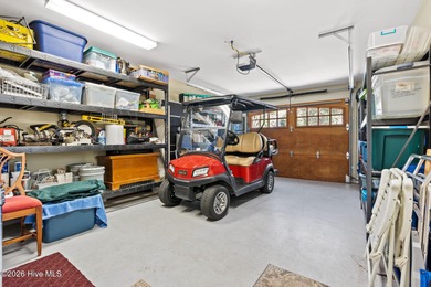 Get ready to fall in love with this luxurious townhome and the on Rivers Edge Golf Club in North Carolina - for sale on GolfHomes.com, golf home, golf lot